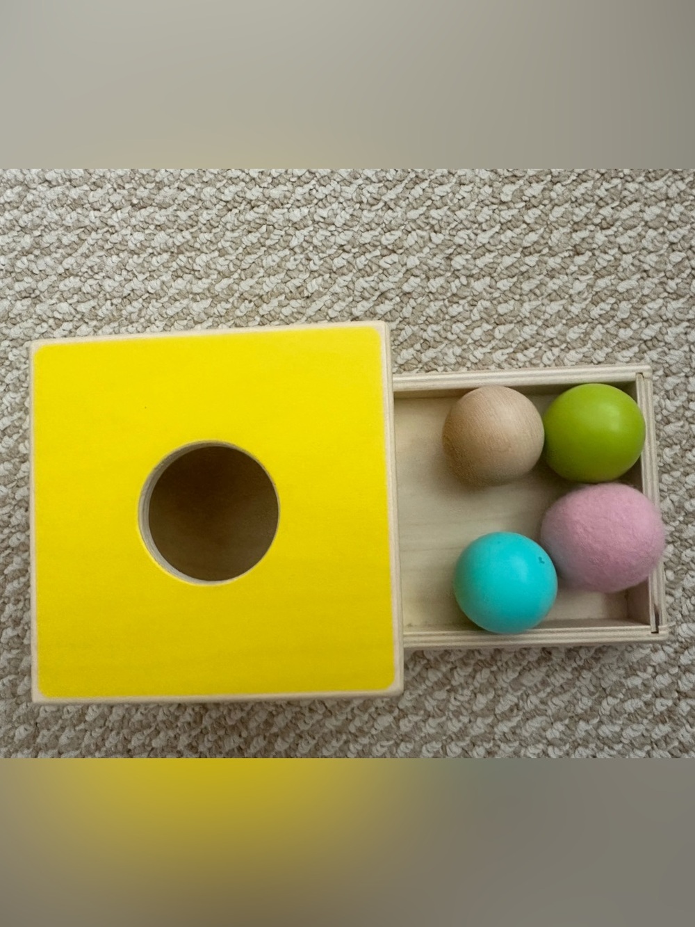 Lovevery wooden ball drop with three wooden balls and 1 felt ball